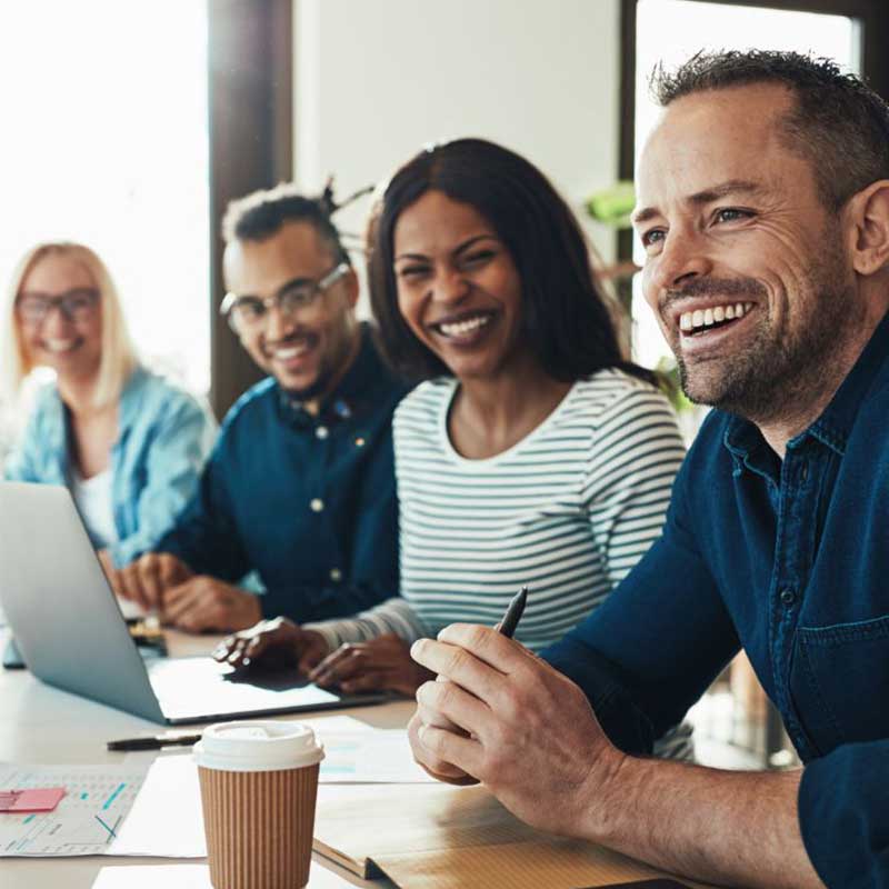 Diverse team smiling together